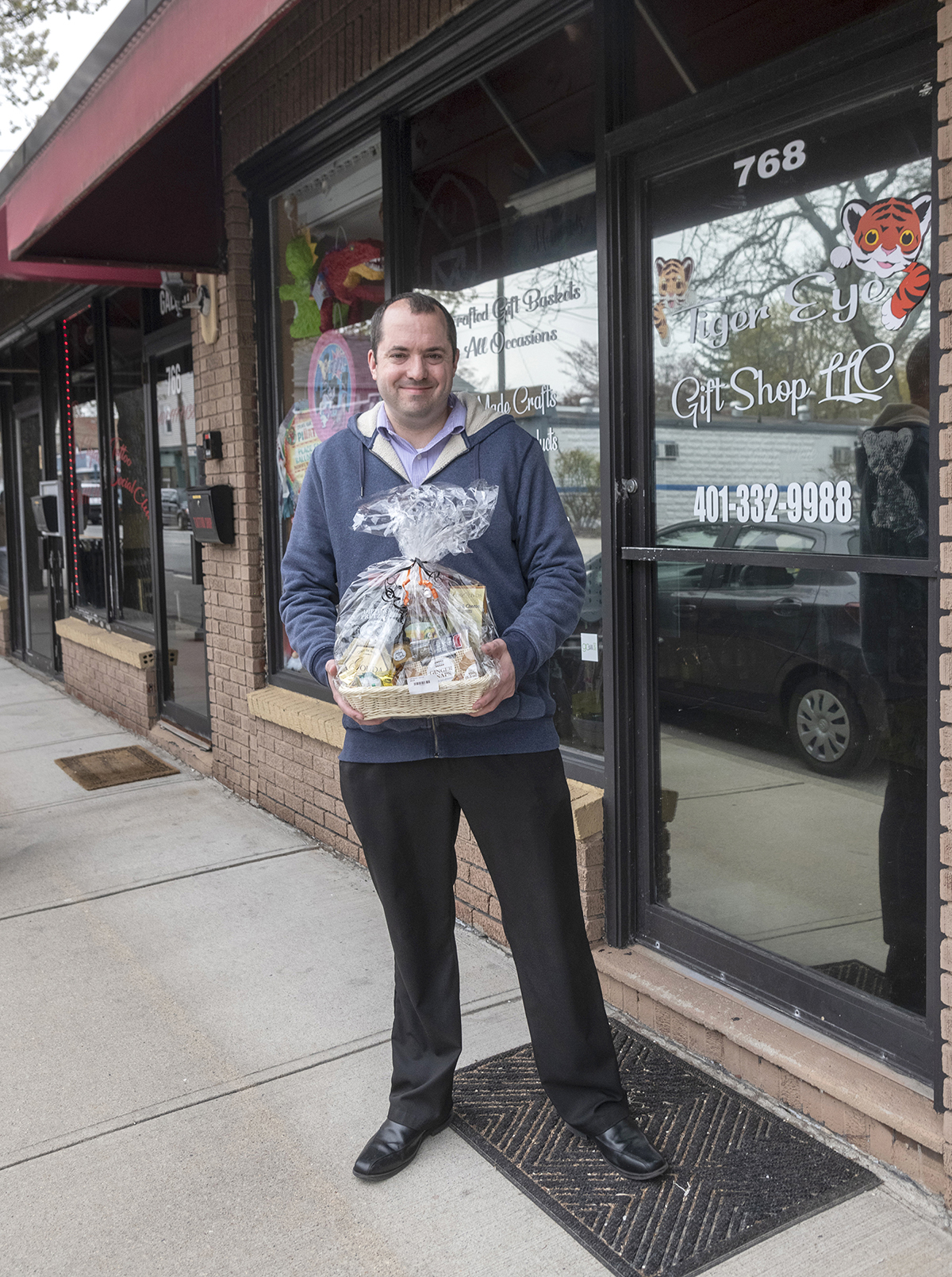 ONLINE OFFERINGS: TigerEye Gift Shop owner Ron Amore Jr. has closed his Warwick shop but is selling holiday gift baskets through his website and pickup system. / PBN PHOTO/MICHAEL SALERNO